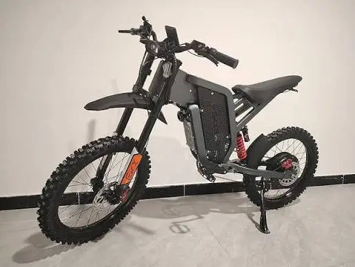 Black electric mountain bike, full suspension, fat tires, and hydraulic disc brakes.