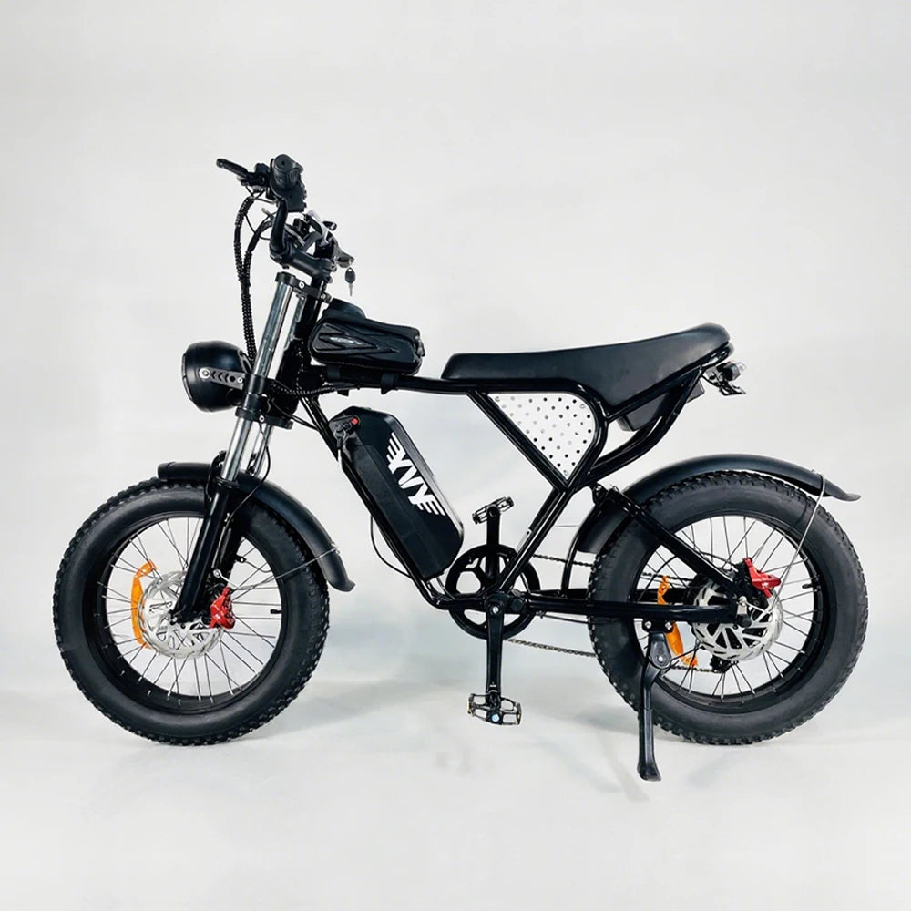 Black electric fat-tire bike with mounted battery, front fork suspension, disc brakes