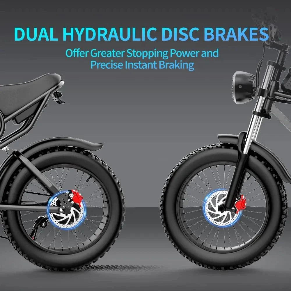 Electric bike dual hydraulic disc brakes visible on front fat tires