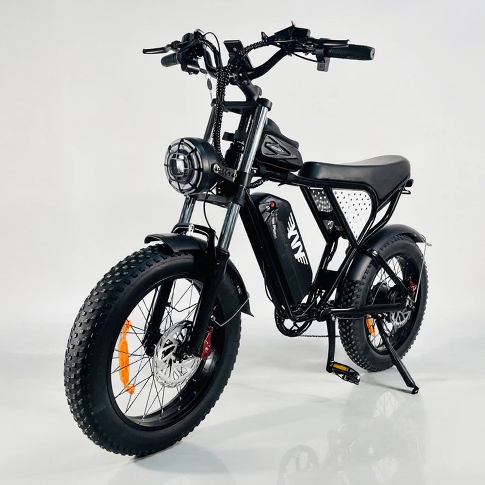Electric fat-tire e-bike with front light, frame battery, knobby tires, disc brakes