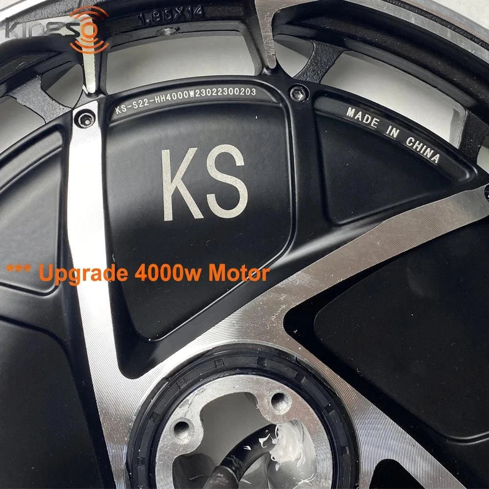 Red and black electric unicycle battery cover with KS logo and charging area