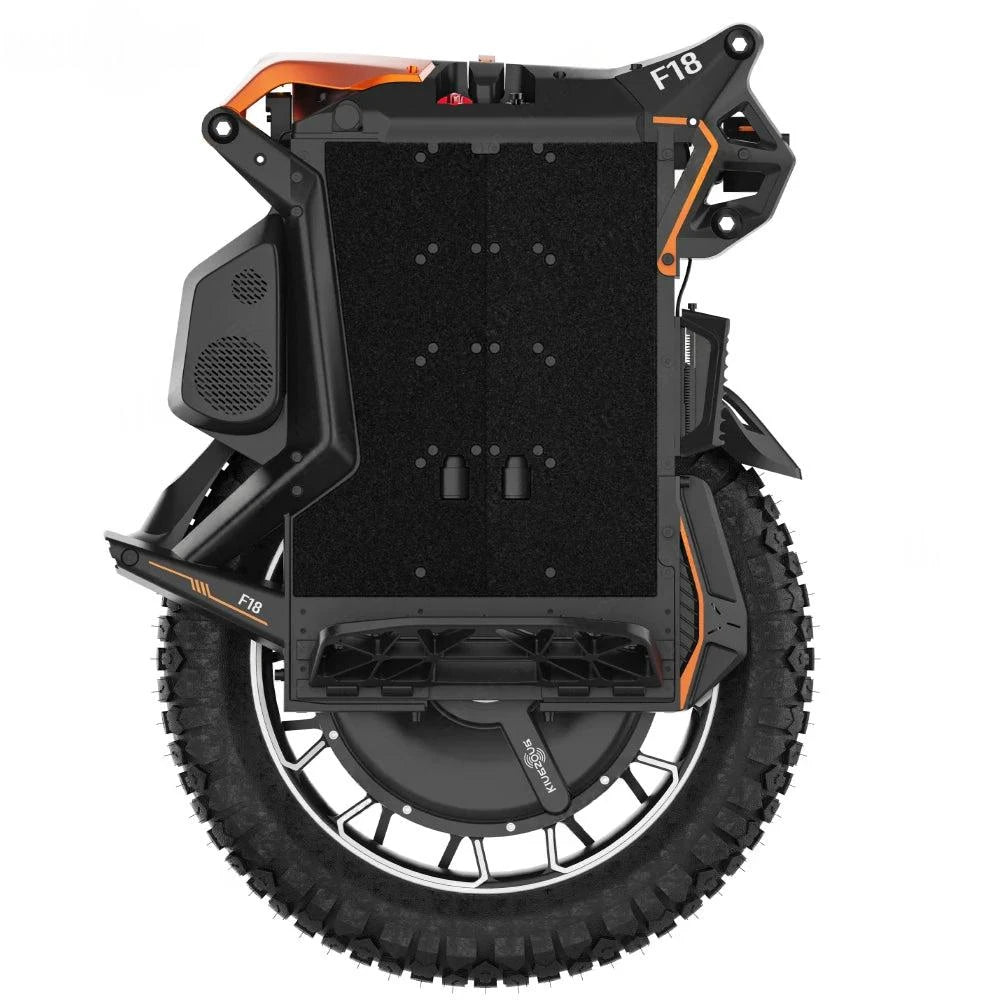 Electric unicycle side view with black casing, large knobby tire, orange trim and foot platforms