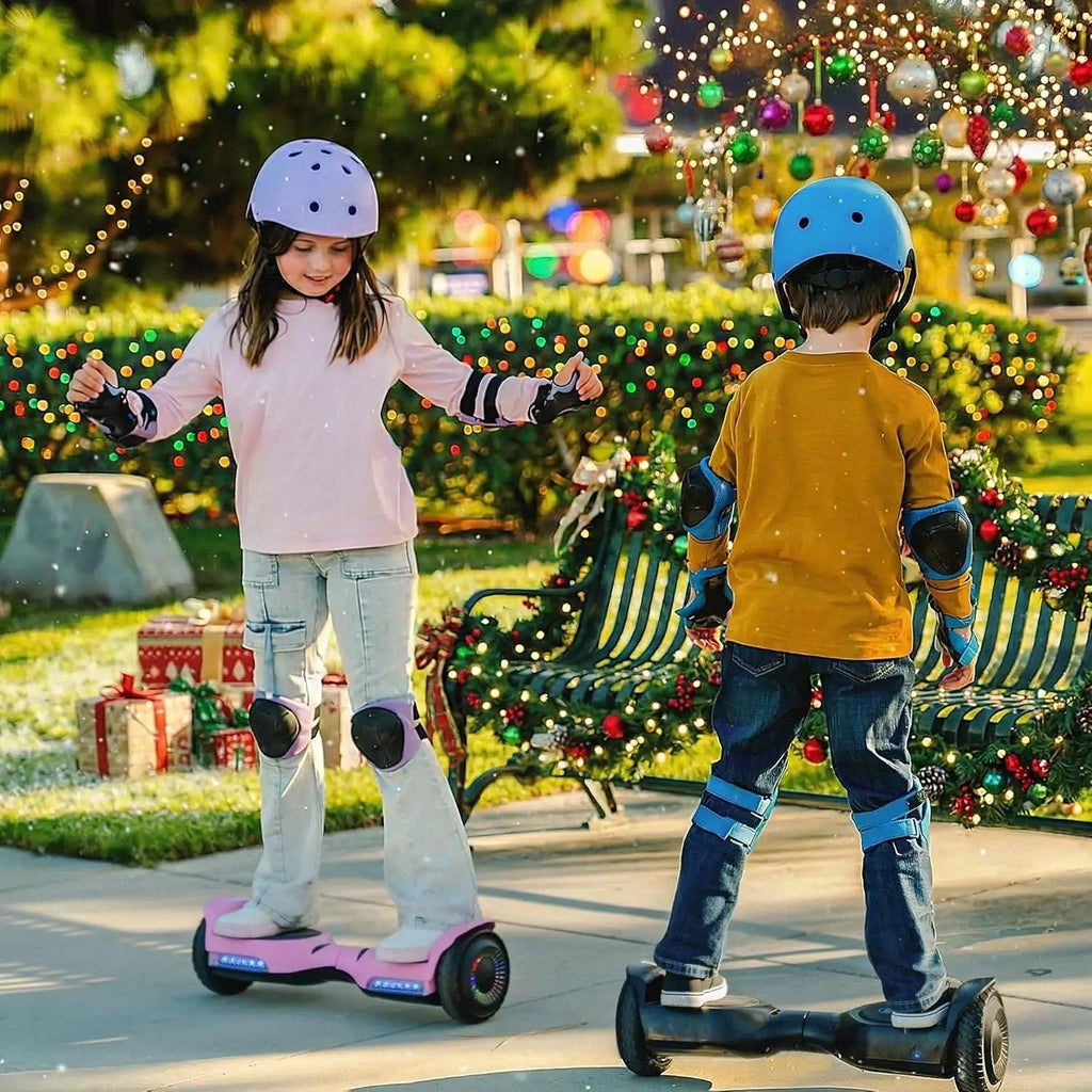 All-terrain hoverboard on deck with teal wheel lights and wide off-road tread, black
