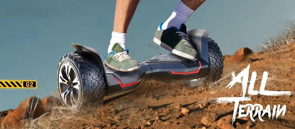 Blue all-terrain hoverboard on rocky terrain with dual LED accent strips