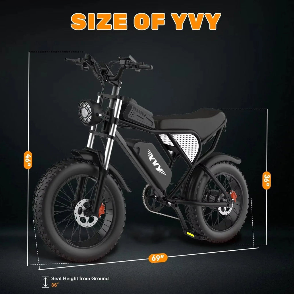 Compact electric fat-tire bike with front suspension, black frame, and cushioned seat.
