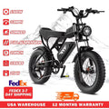 Electric full-suspension fat-tire bike, black frame with front headlight and LED display.